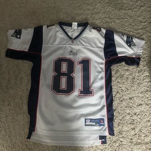 Boys Randy Moss jersey size XL, 14-16.